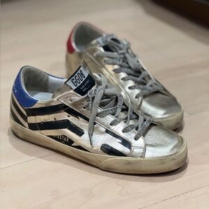 Golden Goose Metallic Gold Sneakers with Blue and Red Details